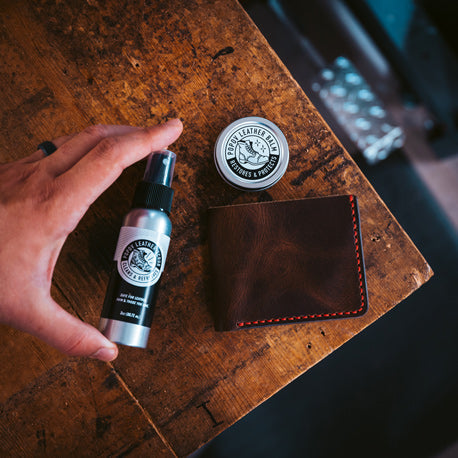 man holding Popov Leather Scrub