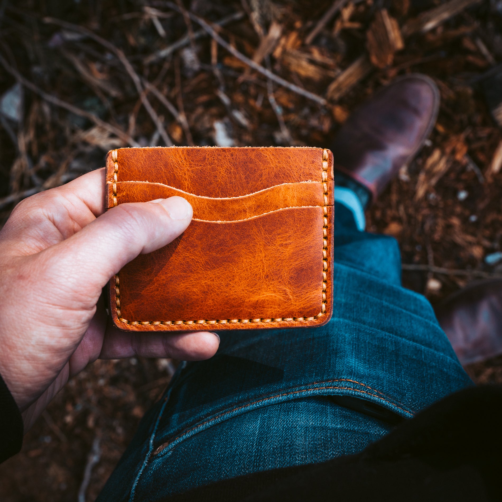 Holding a Leather ID Wallet in English Tan