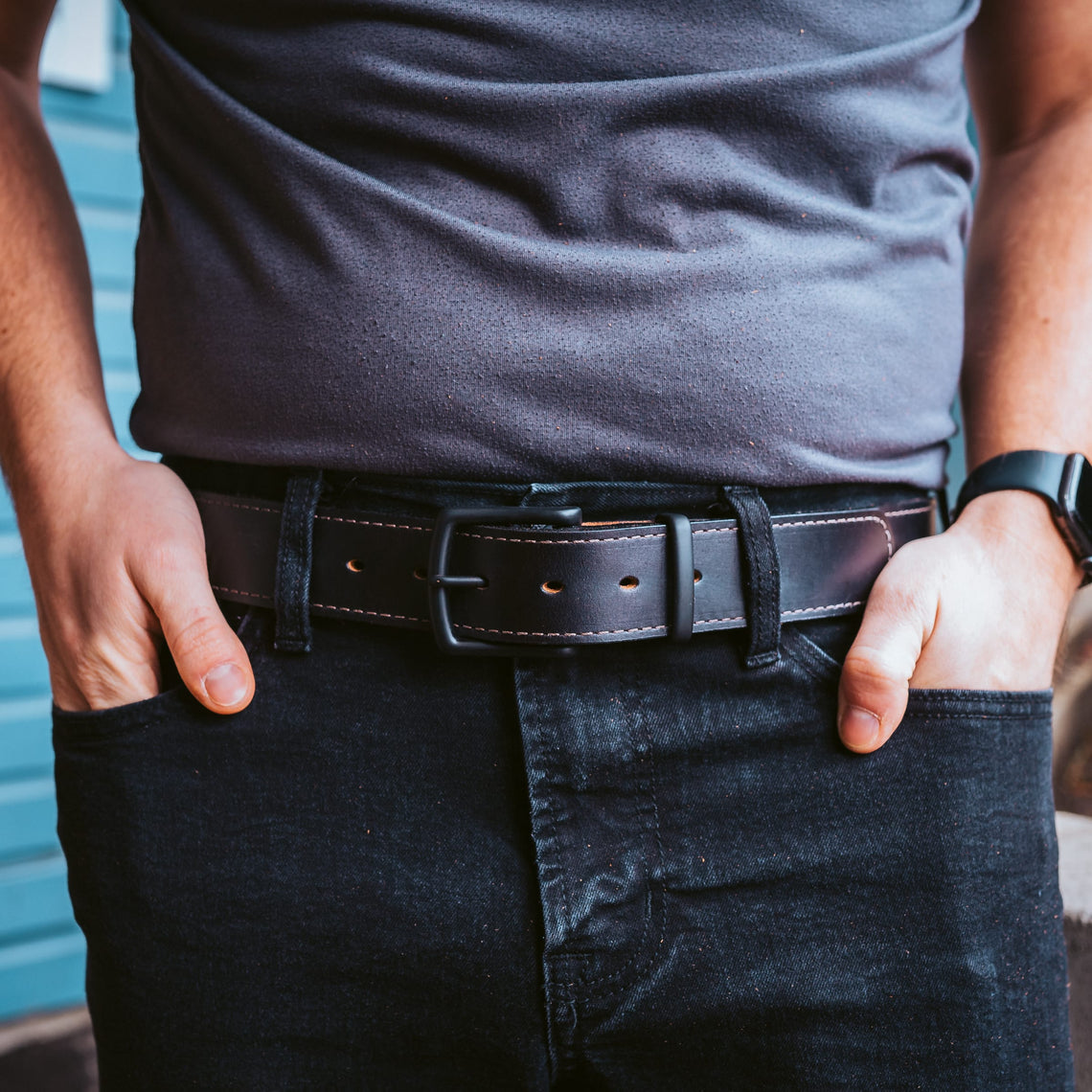 Black full-grain leather belt with stitched edge
